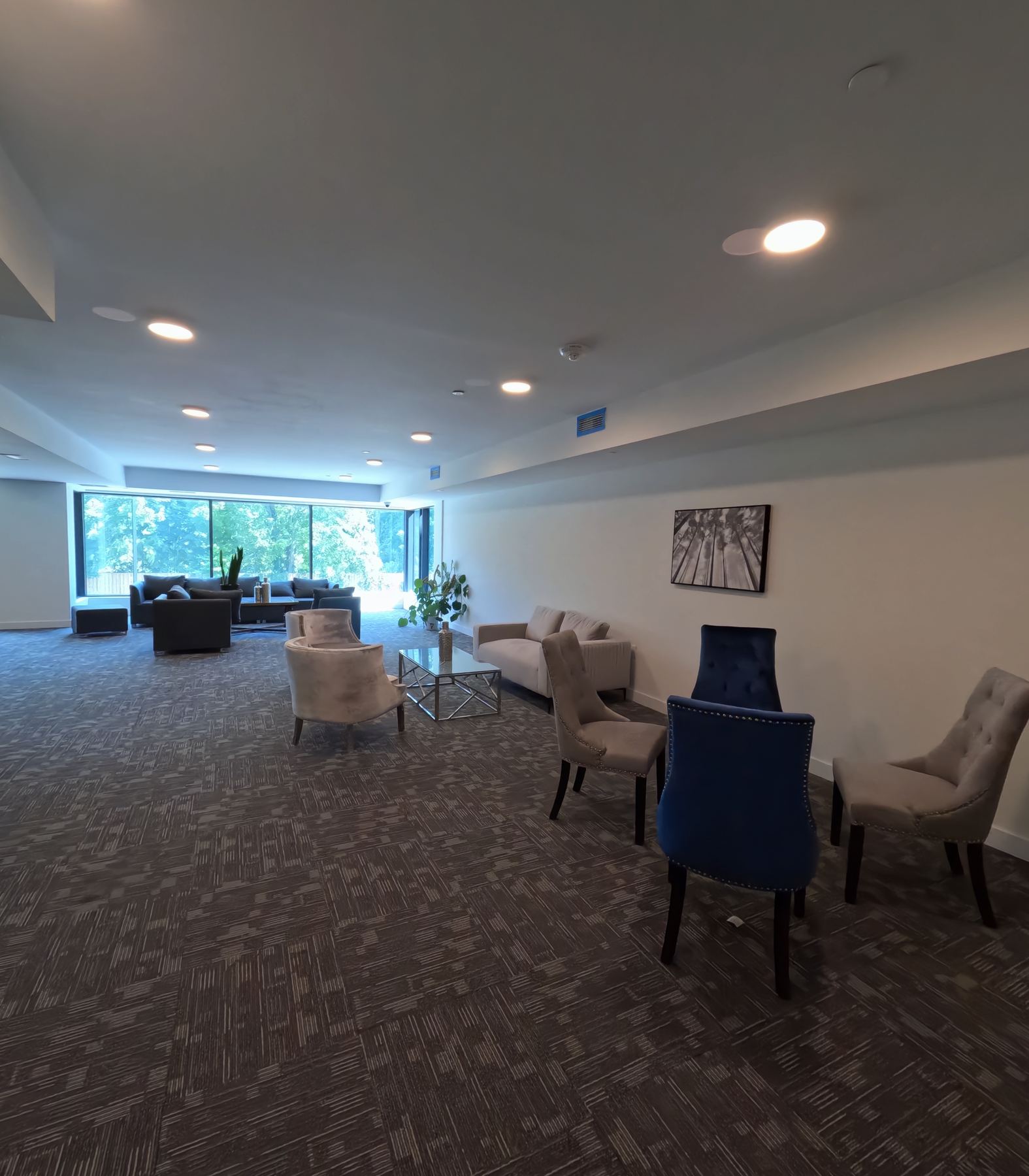 Lounge, wide view at CAEEDAR, 325 University Ave W Cobourg