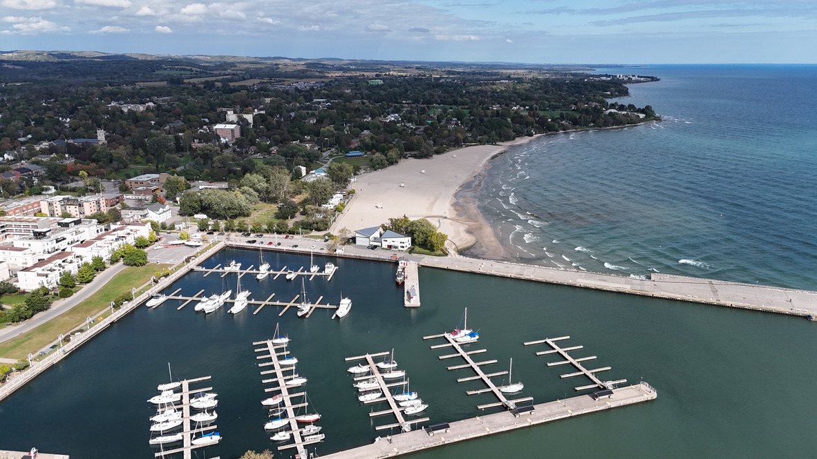 Aerial view of Cobourg Harbour marina, Victoria Park Beach and Lake Ontario